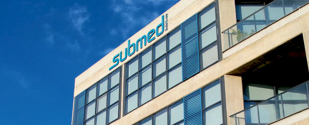 SUBMED company building with the Submed logo on the facade